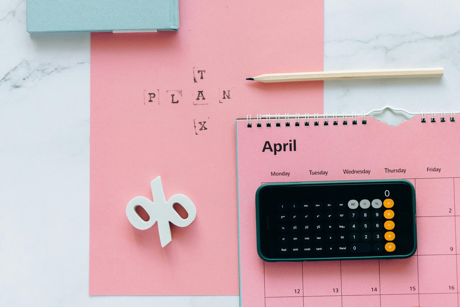 People managing their calendar at a busy office.